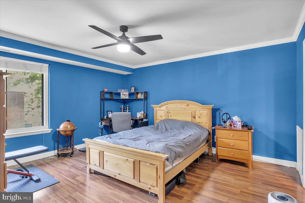 117 Echelon Road Voorhees, NJ 08043 - Photo 13 of 21 a bedroom with a bed and wooden floor
