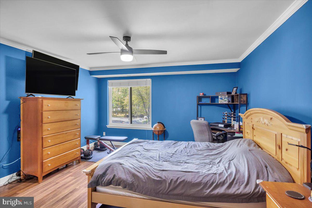 117 Echelon Road Voorhees, NJ 08043 - Photo 14 of 21 a bed room with a bed and a television