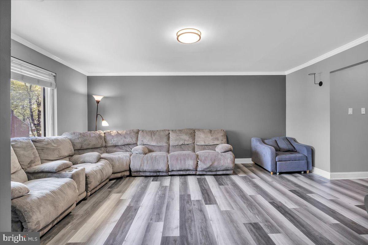 117 Echelon Road Voorhees, NJ 08043 - Photo 3 of 21 a spacious bedroom with a bed and a couch