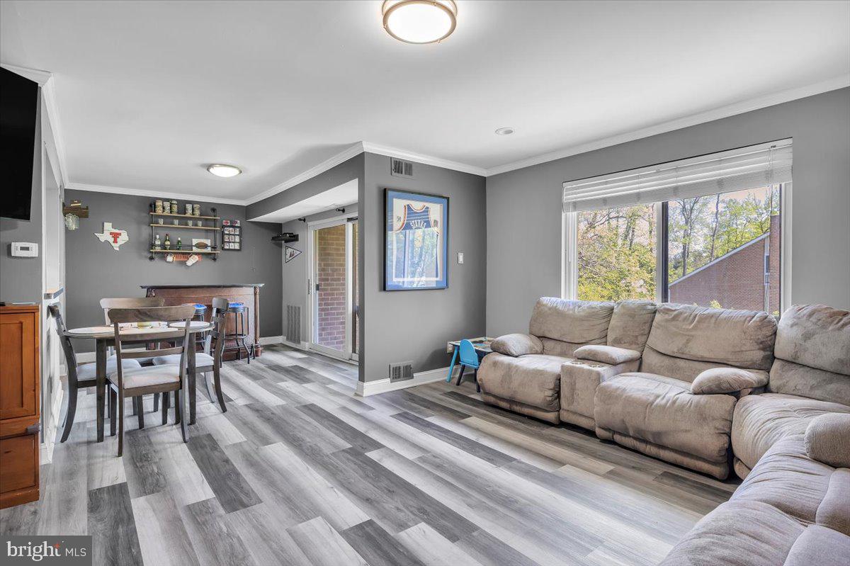 117 Echelon Road Voorhees, NJ 08043 - Photo 4 of 21 a living room with furniture and a window