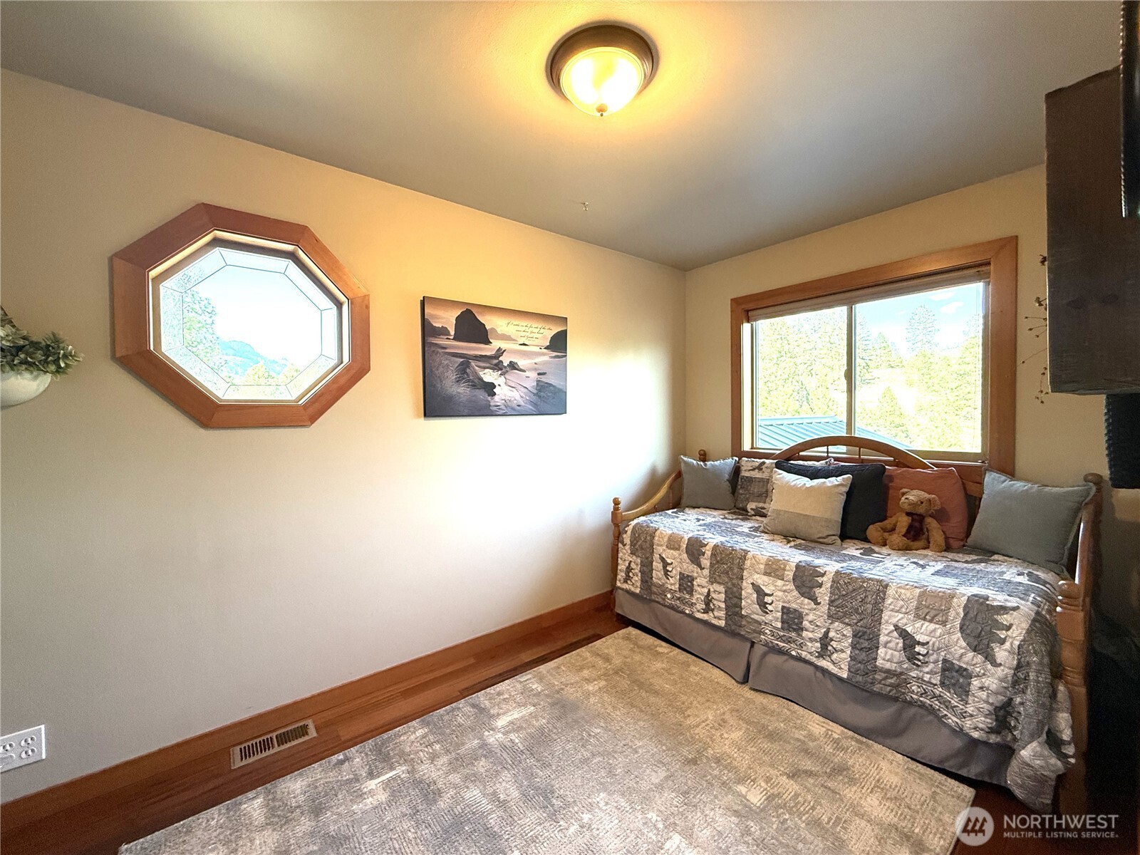 8 Julian Bay Road Republic, WA 99166 - Photo 10 of 40 a bedroom with bed and a window