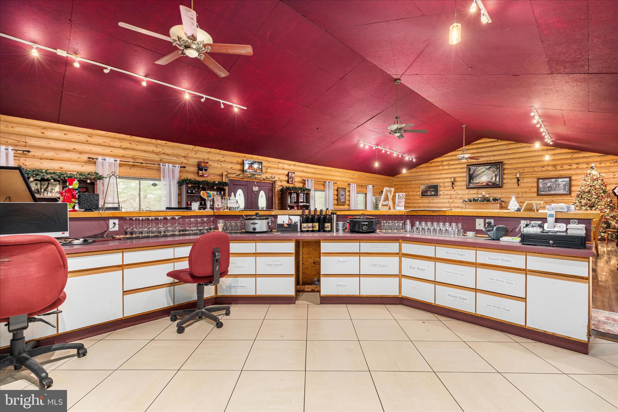43301 Spinks Ferry Road Leesburg, VA 20176 - Photo 18 of 102 a kitchen with stainless steel appliances kitchen island granite countertop a sink and cabinets