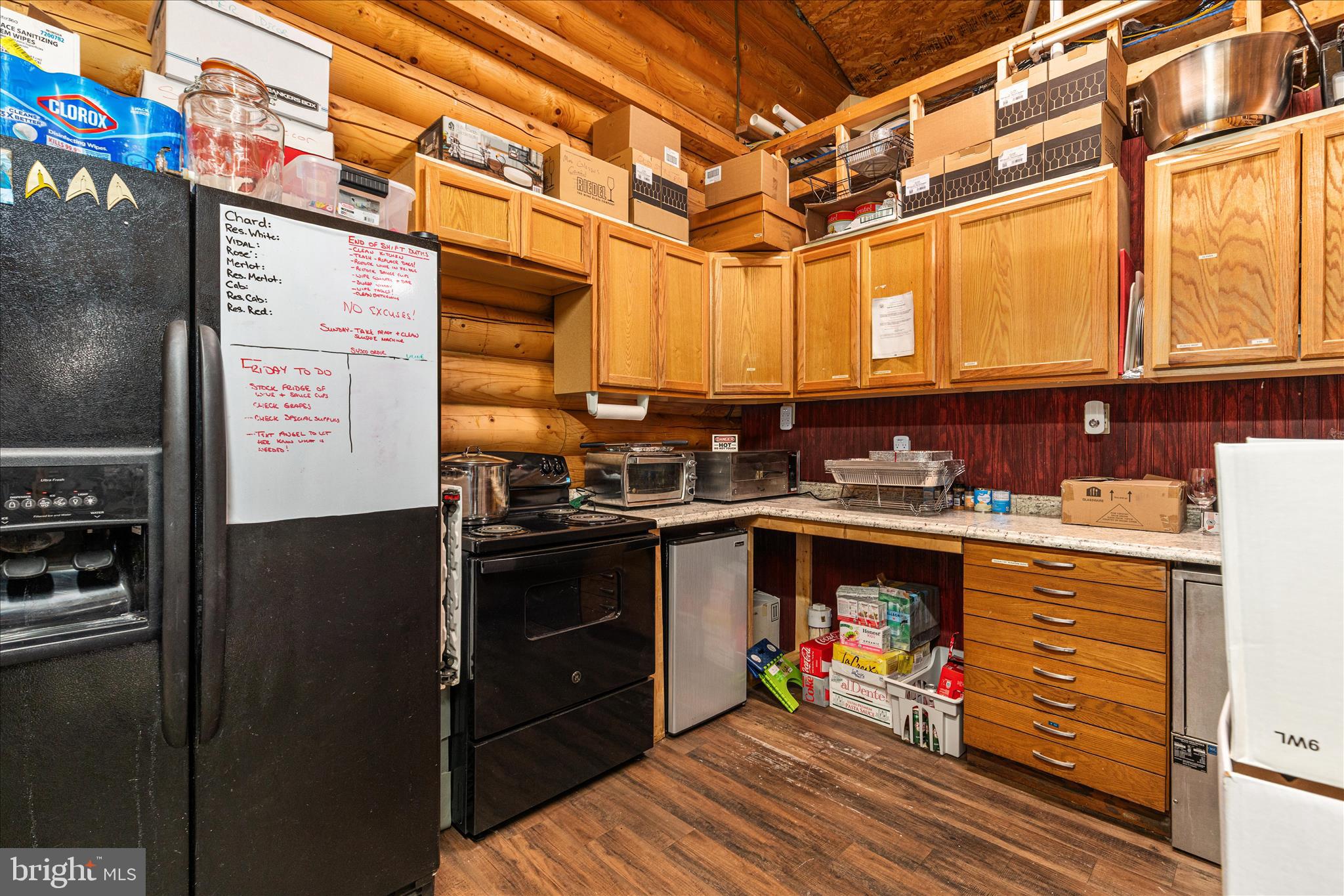 43301 Spinks Ferry Road Leesburg, VA 20176 - Photo 22 of 102 a kitchen with stainless steel appliances granite countertop a refrigerator and a sink