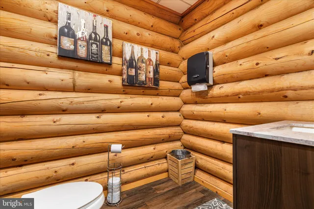 a living room with a couch and a window