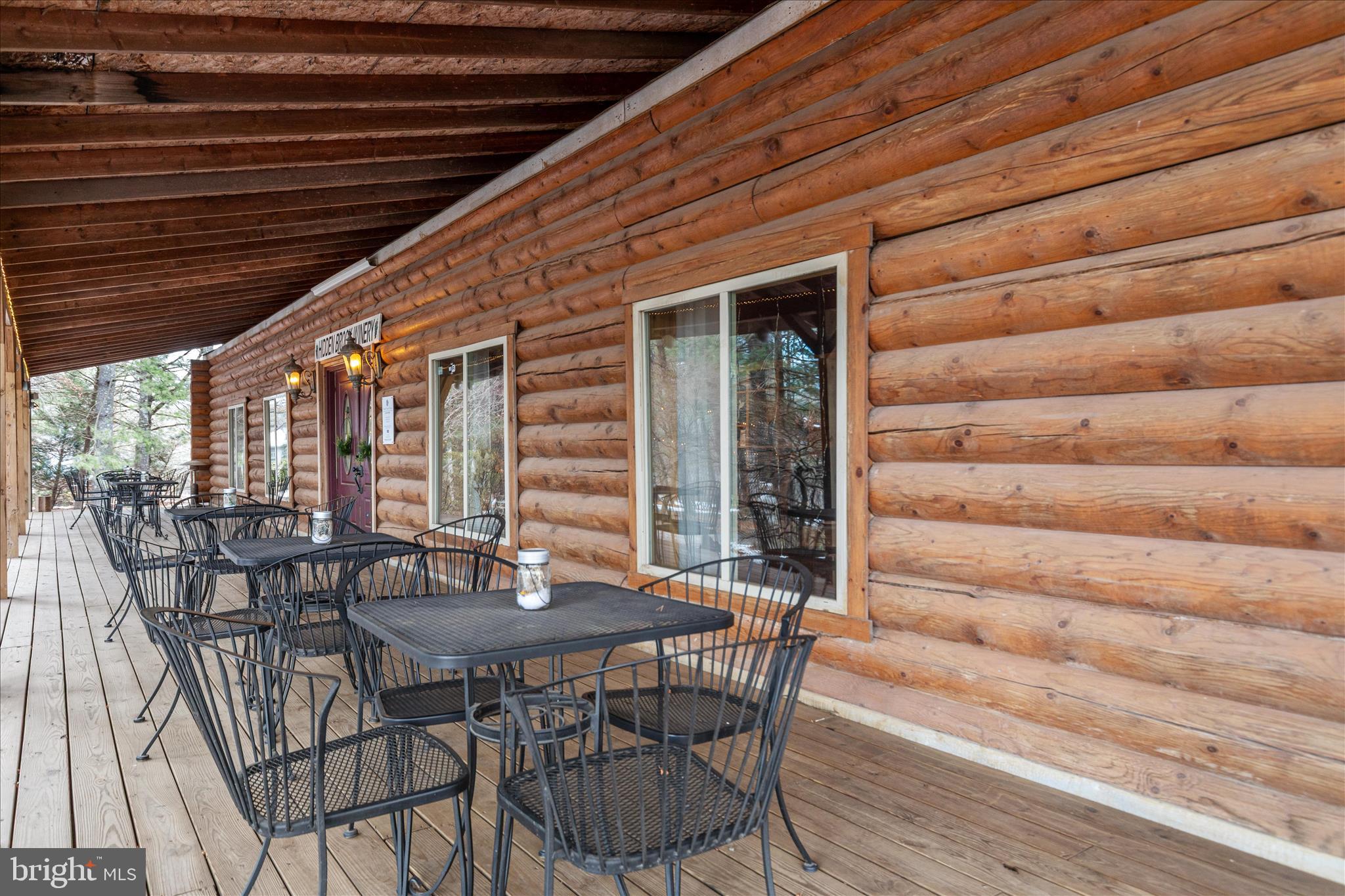 43301 Spinks Ferry Road Leesburg, VA 20176 - Photo 38 of 102 a patio with table and chairs and potted plants
