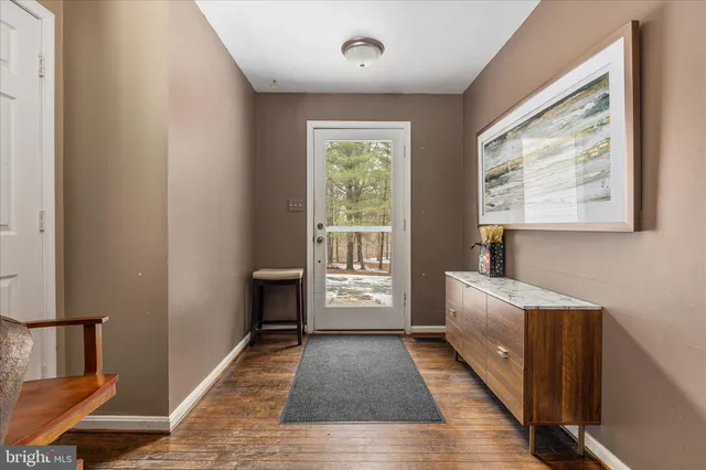 a view of a backyard of the house