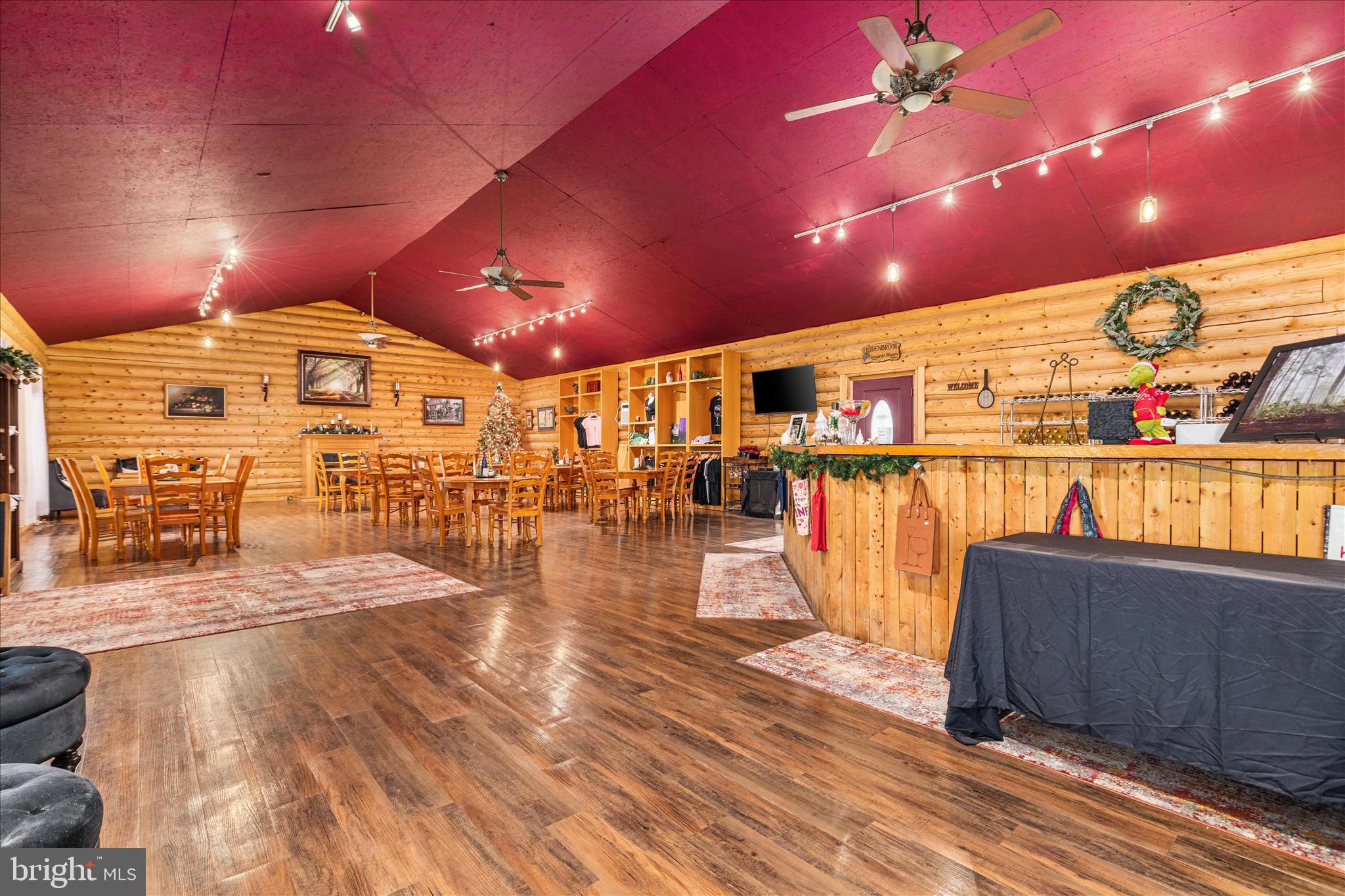 43301 Spinks Ferry Road Leesburg, VA 20176 - Photo 6 of 102 a view of a projector room with wooden floor