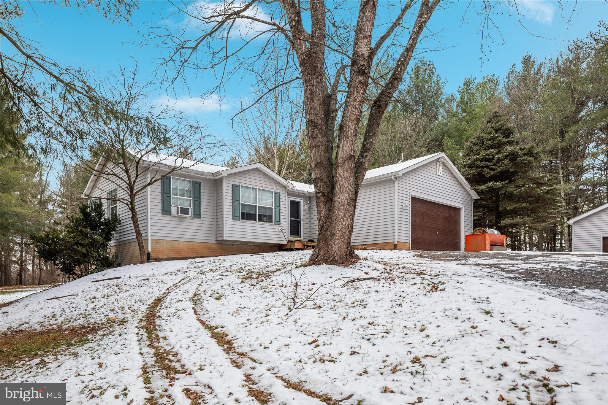 43301 Spinks Ferry Road Leesburg, VA 20176 - Photo 75 of 102 a front view of a house with a yard covered in snow