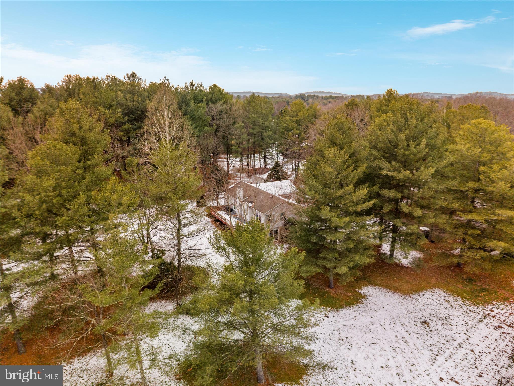 43301 Spinks Ferry Road Leesburg, VA 20176 - Photo 99 of 102 a view of a lake with mountains in the background
