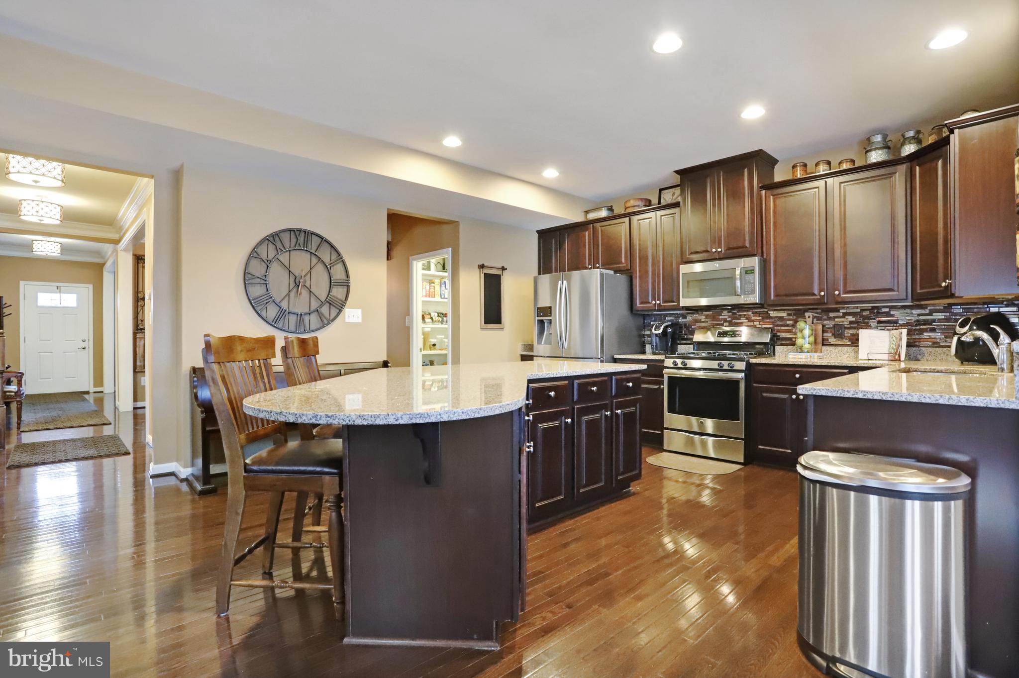 164 Mountain Laurel Boulevard Ranson, WV 25438 - Photo 11 of 51 Large kitchen w/island and granite countertops