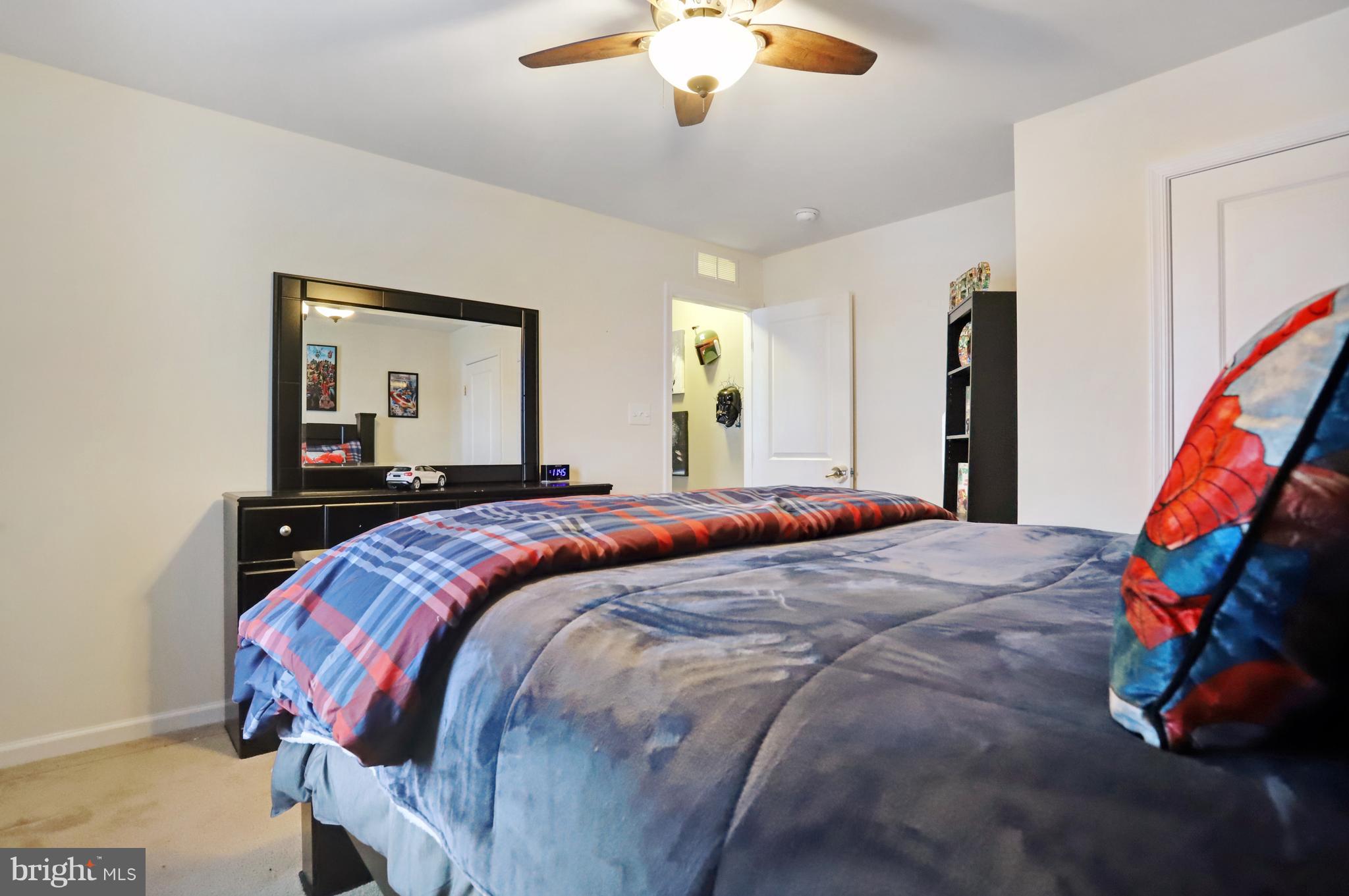 164 Mountain Laurel Boulevard Ranson, WV 25438 - Photo 26 of 51 Bedroom 2 w/carpet flooring and ceiling fan