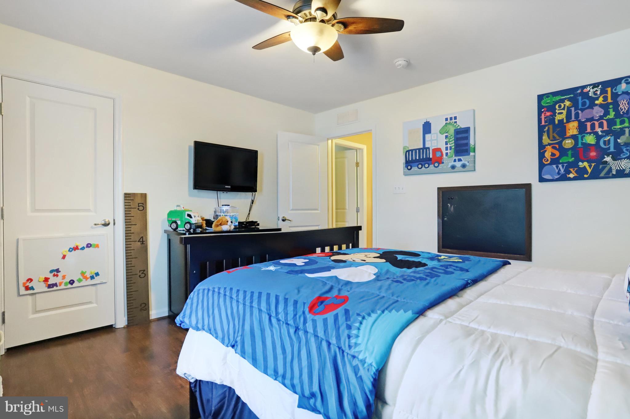 164 Mountain Laurel Boulevard Ranson, WV 25438 - Photo 27 of 51 Bedroom 3 w/carpet flooring and ceiling fan
