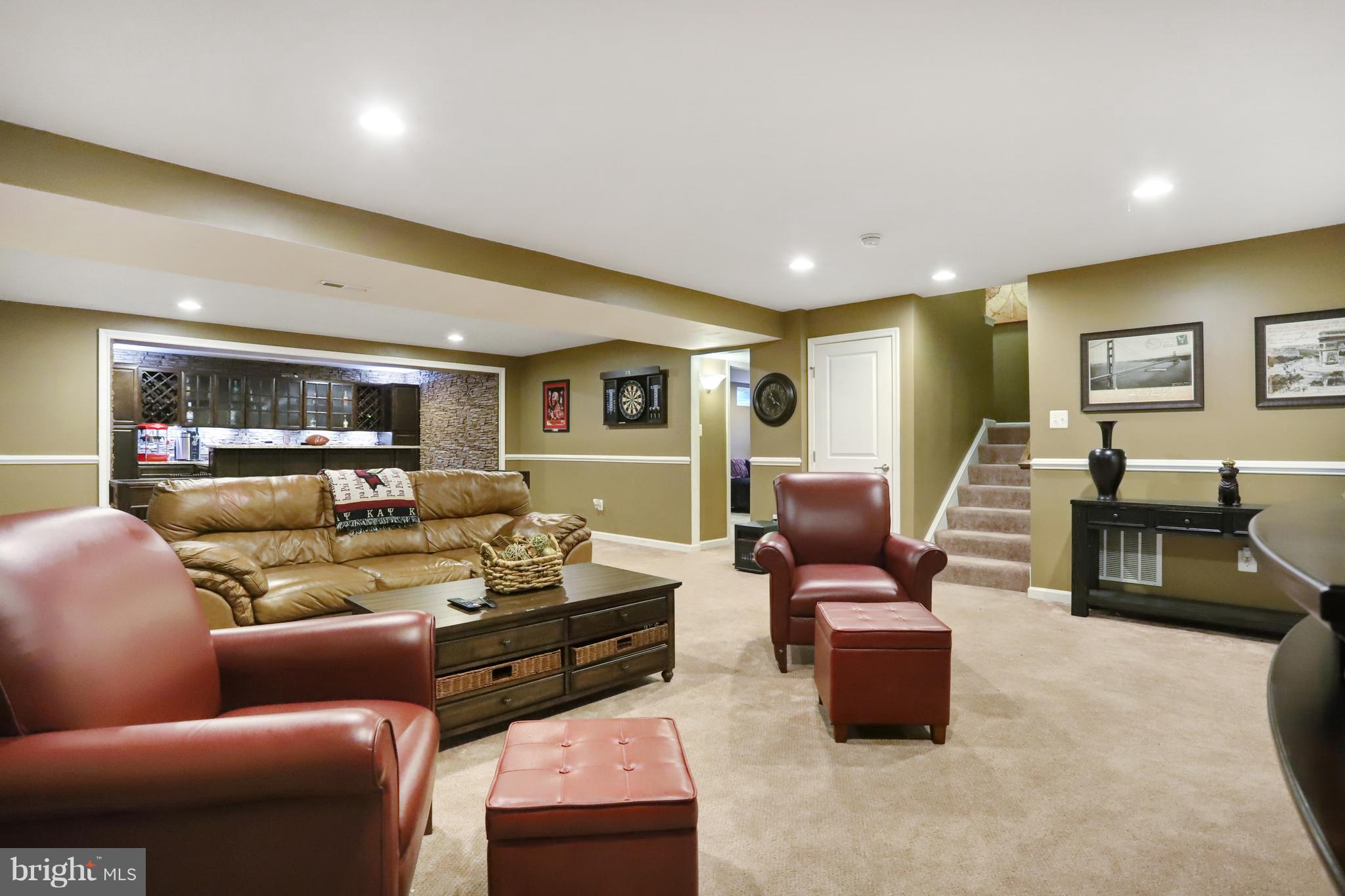 164 Mountain Laurel Boulevard Ranson, WV 25438 - Photo 37 of 51 Family room in basement w/wet bar