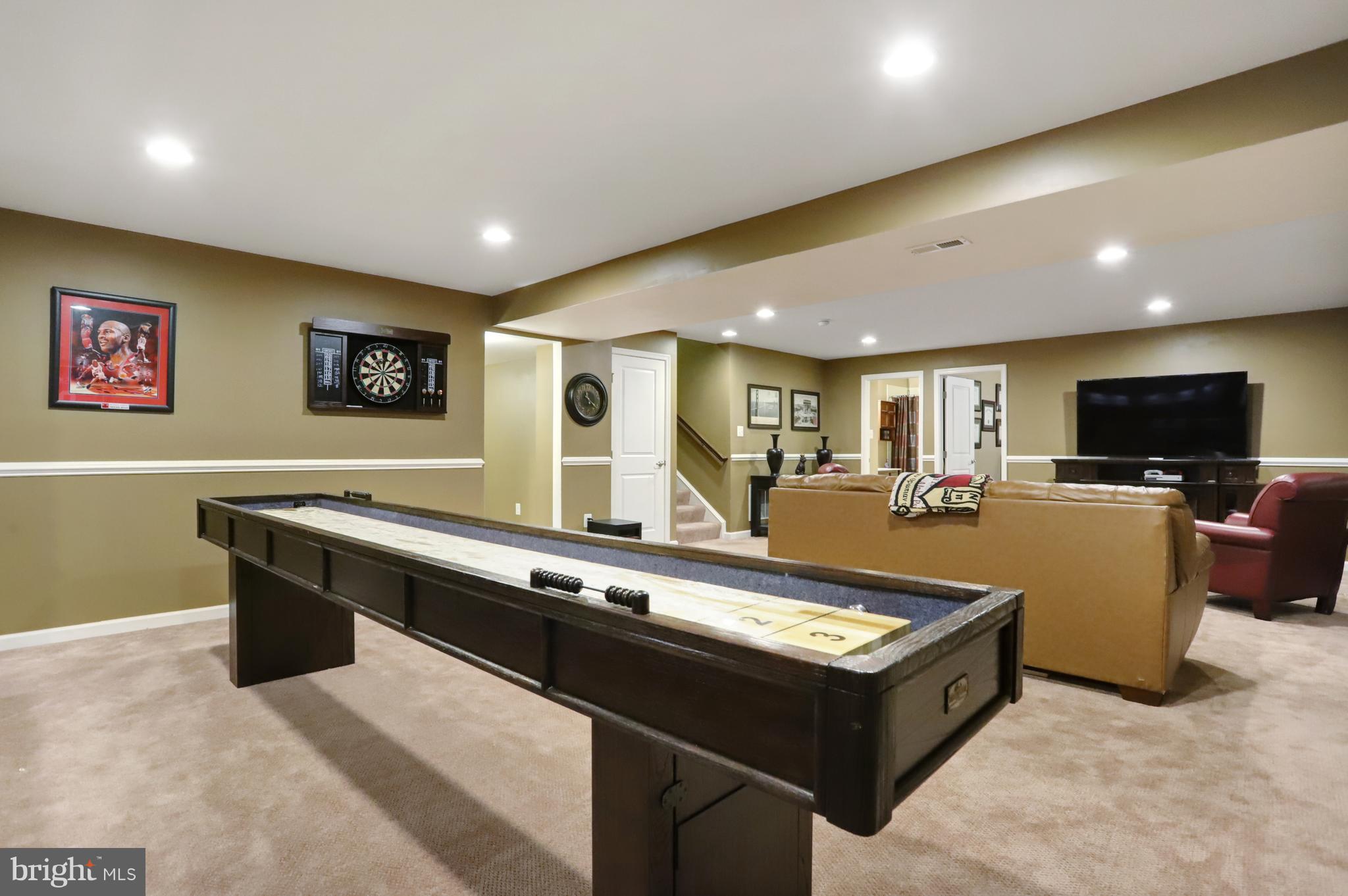 164 Mountain Laurel Boulevard Ranson, WV 25438 - Photo 38 of 51 Family room in basement w/wet bar