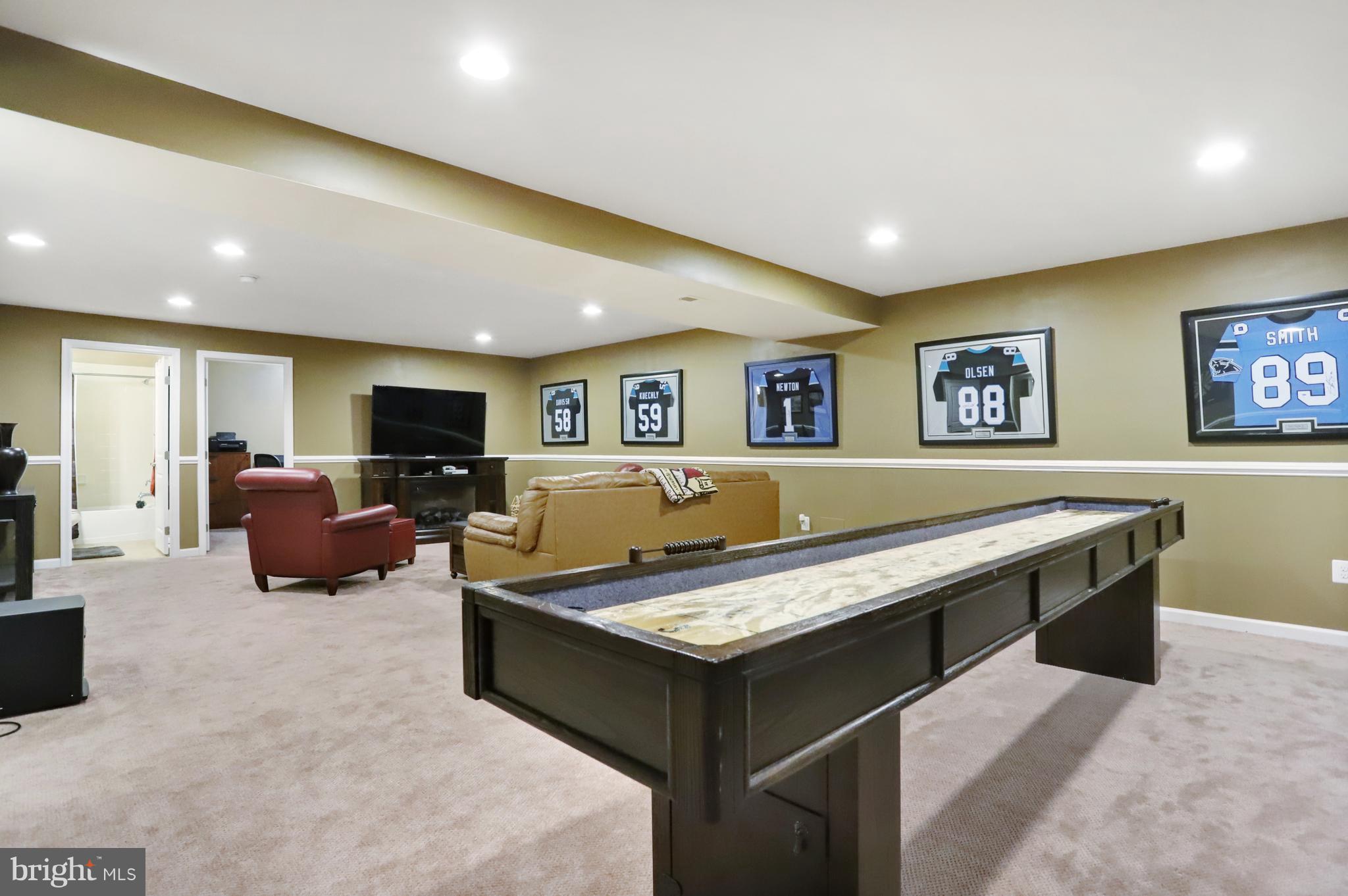 164 Mountain Laurel Boulevard Ranson, WV 25438 - Photo 39 of 51 Family room in basement w/wet bar