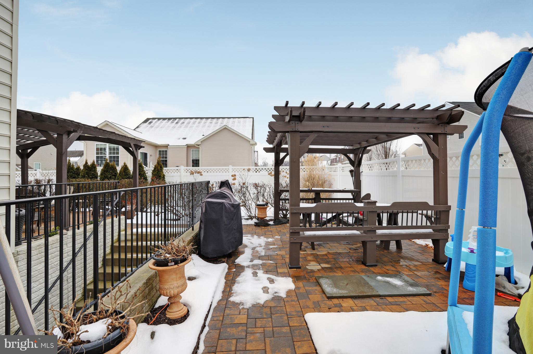 164 Mountain Laurel Boulevard Ranson, WV 25438 - Photo 47 of 51 Beautiful patio that extends to side of home