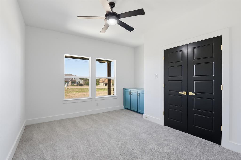6657 Buffalo Ridge Circle Godley, TX 76044 - Photo 23 of 31 a view of an empty room with a window