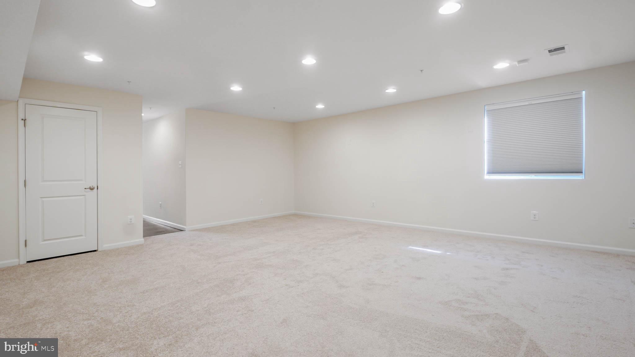 7869 Patterson Way Hanover, MD 21076 - Photo 5 of 41 Plenty of room for games and couches