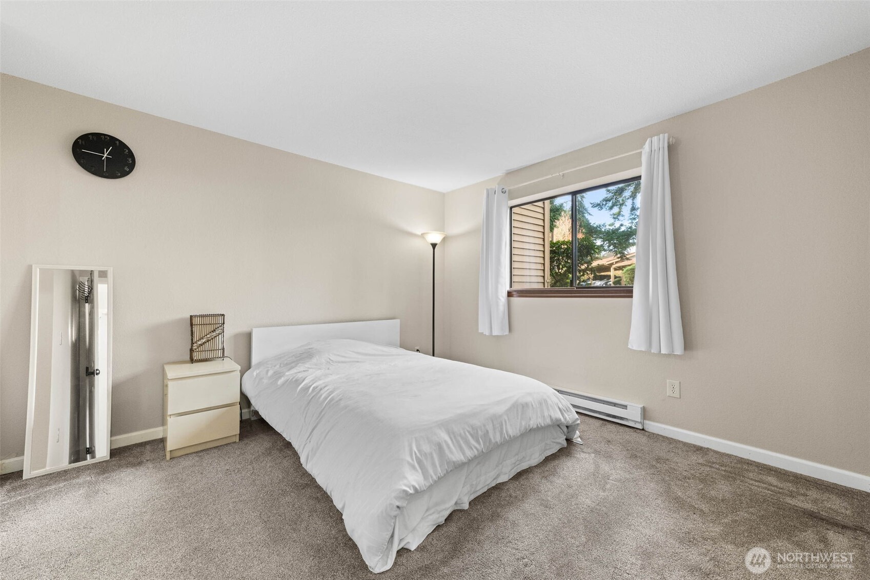 1002 South 312th Street, Unit 114 Federal Way, WA 98003 - Photo 13 of 39 a bedroom with a bed and window