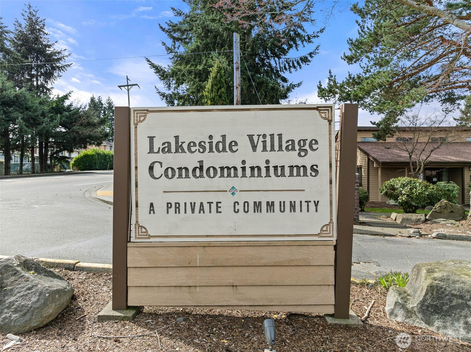 1002 South 312th Street, Unit 114 Federal Way, WA 98003 - Photo 25 of 39 a sign on the side of a road