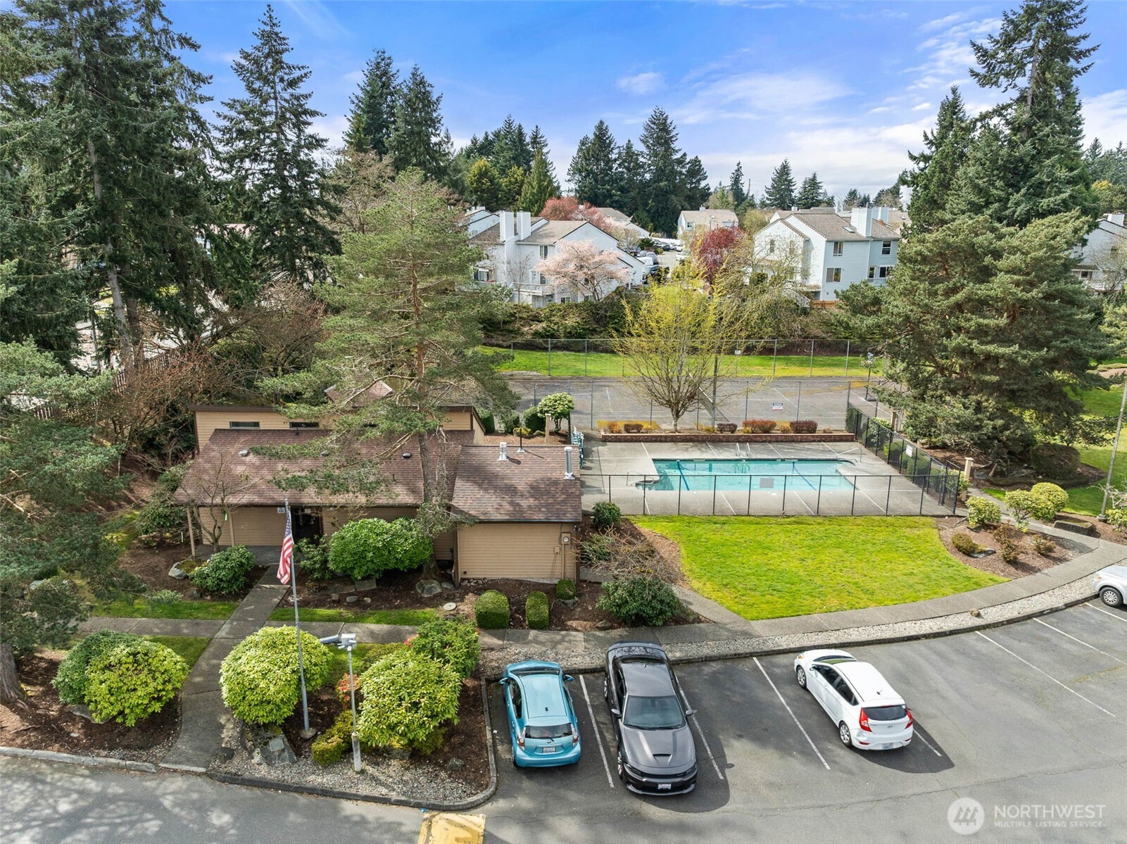 1002 South 312th Street, Unit 114 Federal Way, WA 98003 - Photo 27 of 39 an aerial view of a house with yard swimming pool and outdoor seating