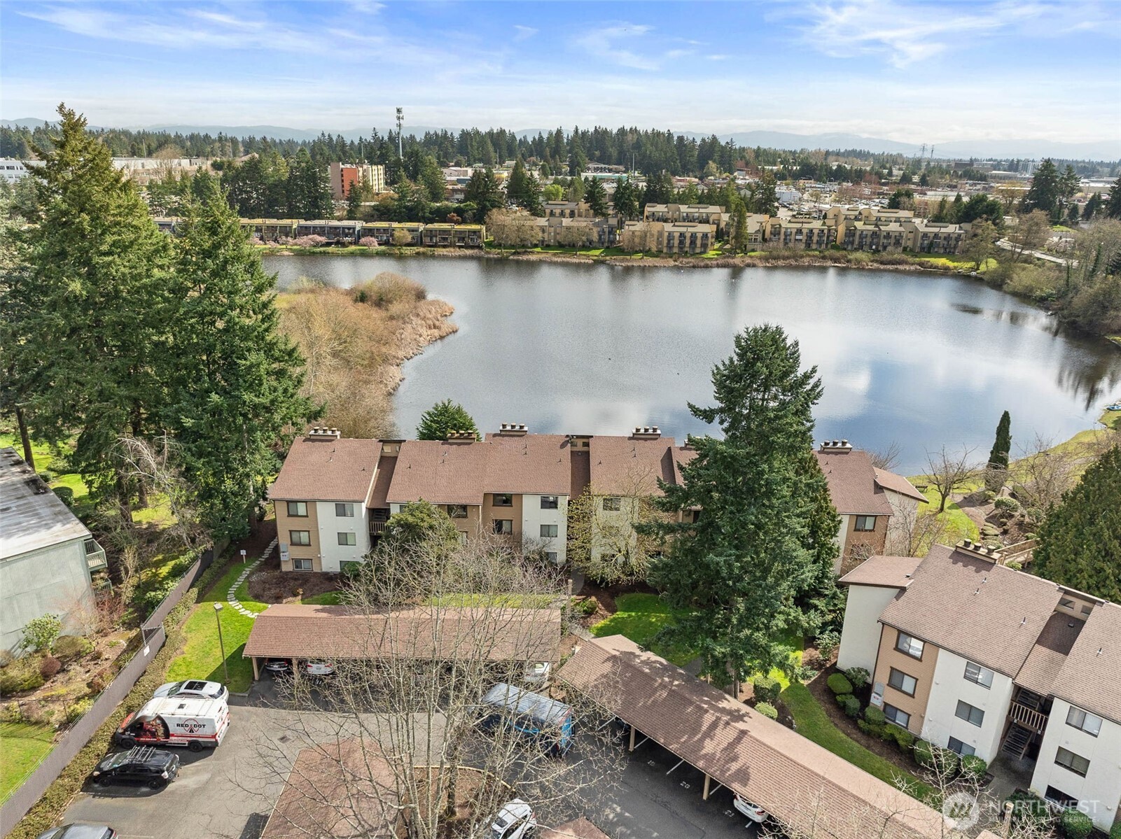 1002 South 312th Street, Unit 114 Federal Way, WA 98003 - Photo 37 of 39 an aerial view of a house with a lake view