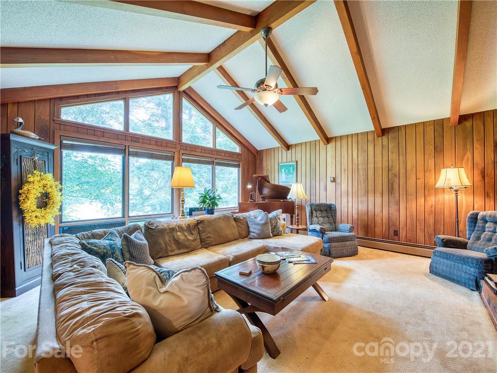 120 Arrowood Acres Road Clyde, NC 28721 - Photo 15 of 42 a living room with furniture and a large window