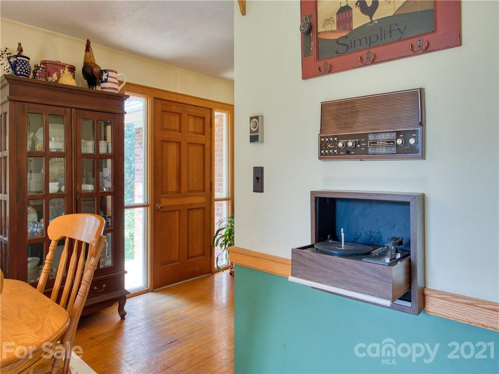 120 Arrowood Acres Road Clyde, NC 28721 - Photo 26 of 42 a view of a livingroom with furniture and a fireplace