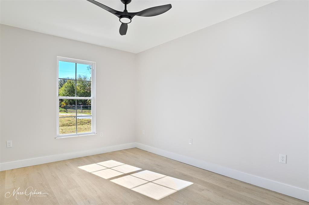 674 Rambin Road Stonewall, LA 71078 - Photo 19 of 26 an empty room with windows