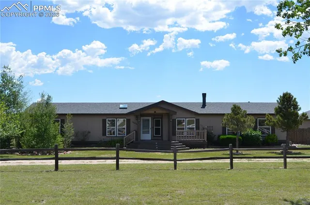 a house view with a garden space