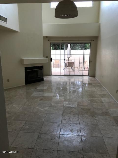 7710 East Gainey Ranch Road, Unit 157 Scottsdale, AZ 85258 - Photo 13 of 16 a view of an empty room with a window