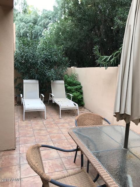 7710 East Gainey Ranch Road, Unit 157 Scottsdale, AZ 85258 - Photo 16 of 16 a view of outdoor space yard and patio