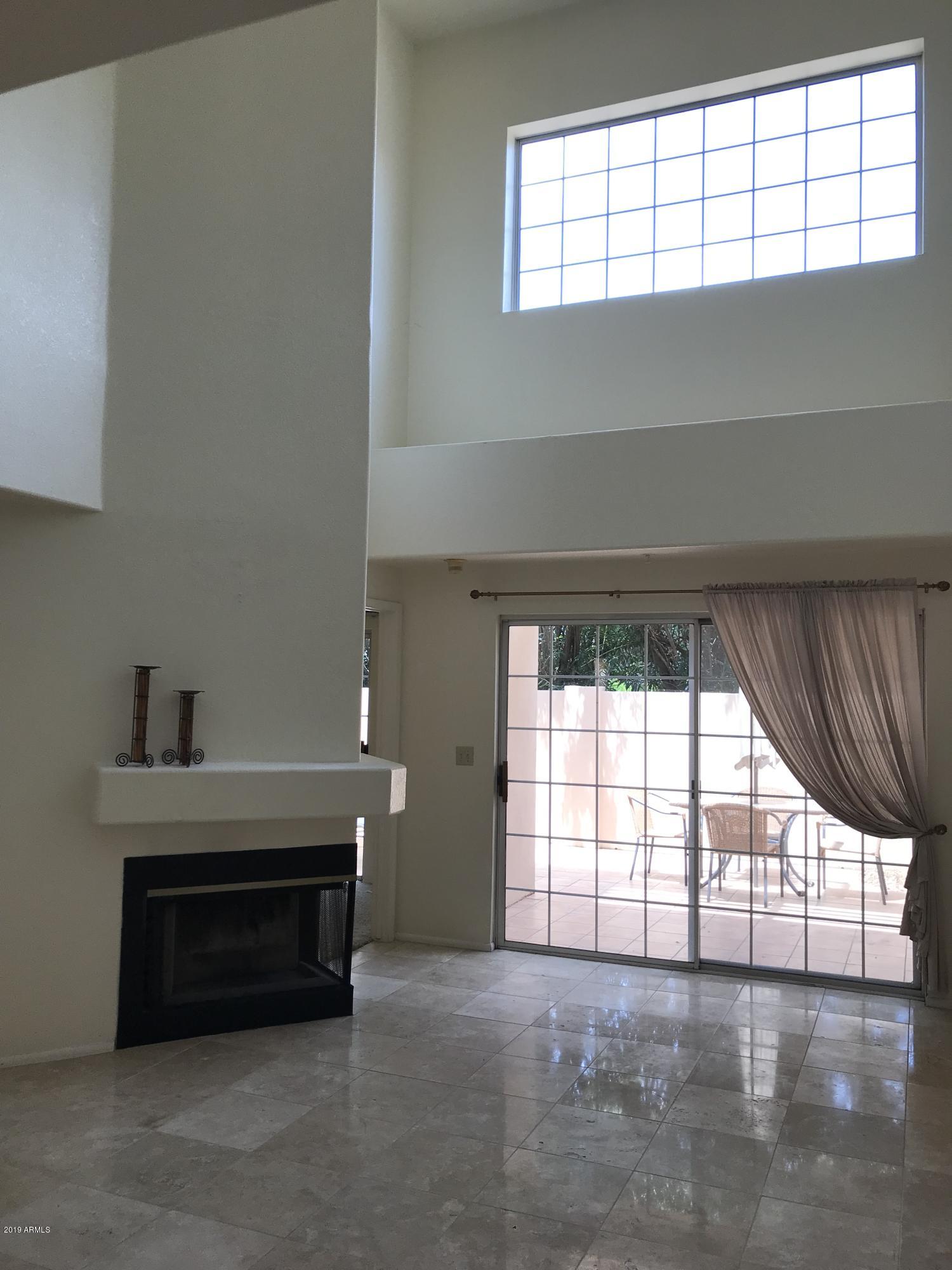7710 East Gainey Ranch Road, Unit 157 Scottsdale, AZ 85258 - Photo 2 of 16 a view of an empty room with a window