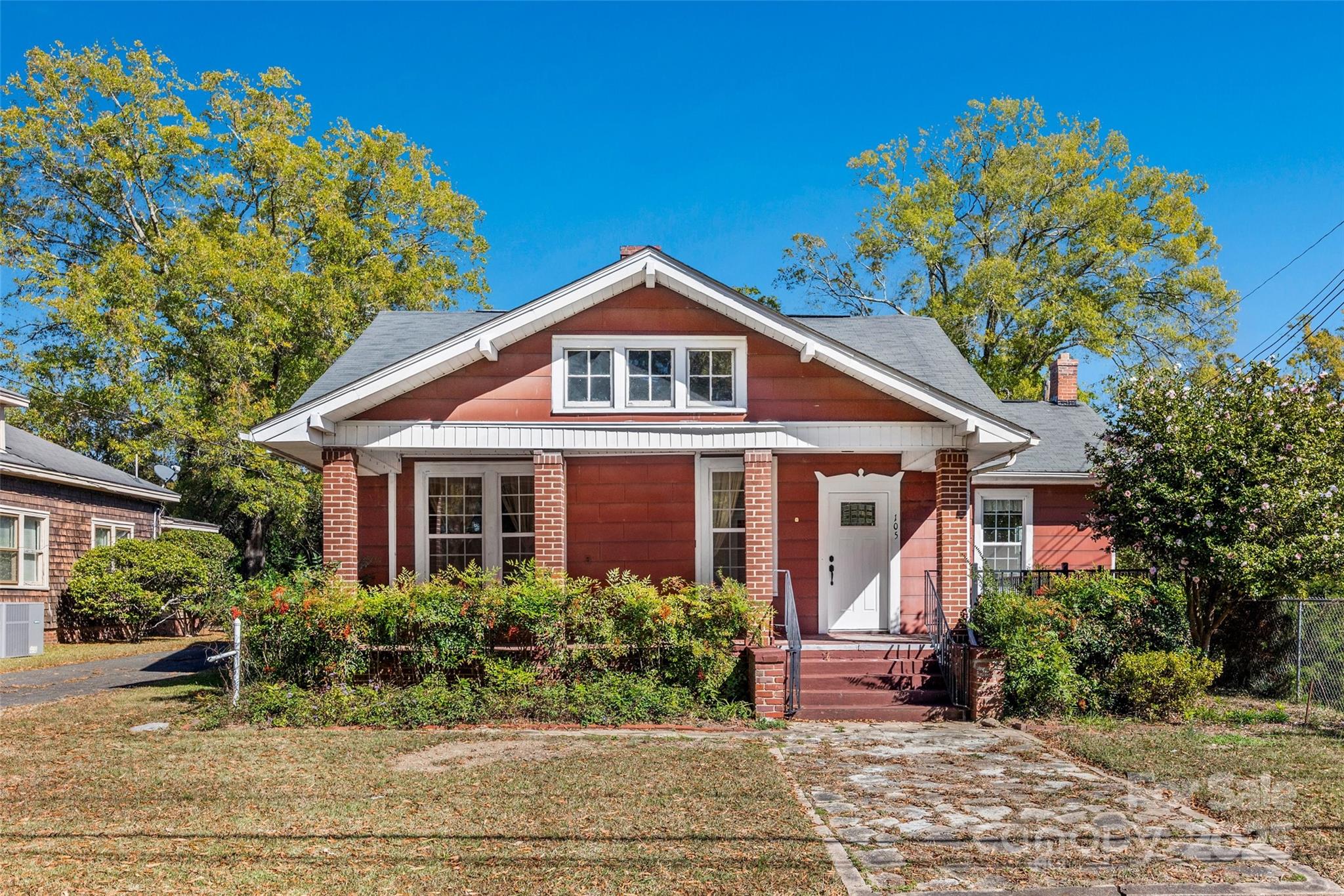 105 Foote Street Chester, SC 29706 - Photo 1 of 28 a front view of a house with a yard