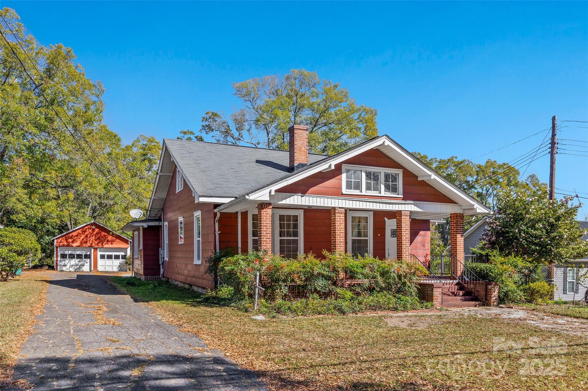 105 Foote Street Chester, SC 29706 - Photo 2 of 28 a front view of a house with a yard