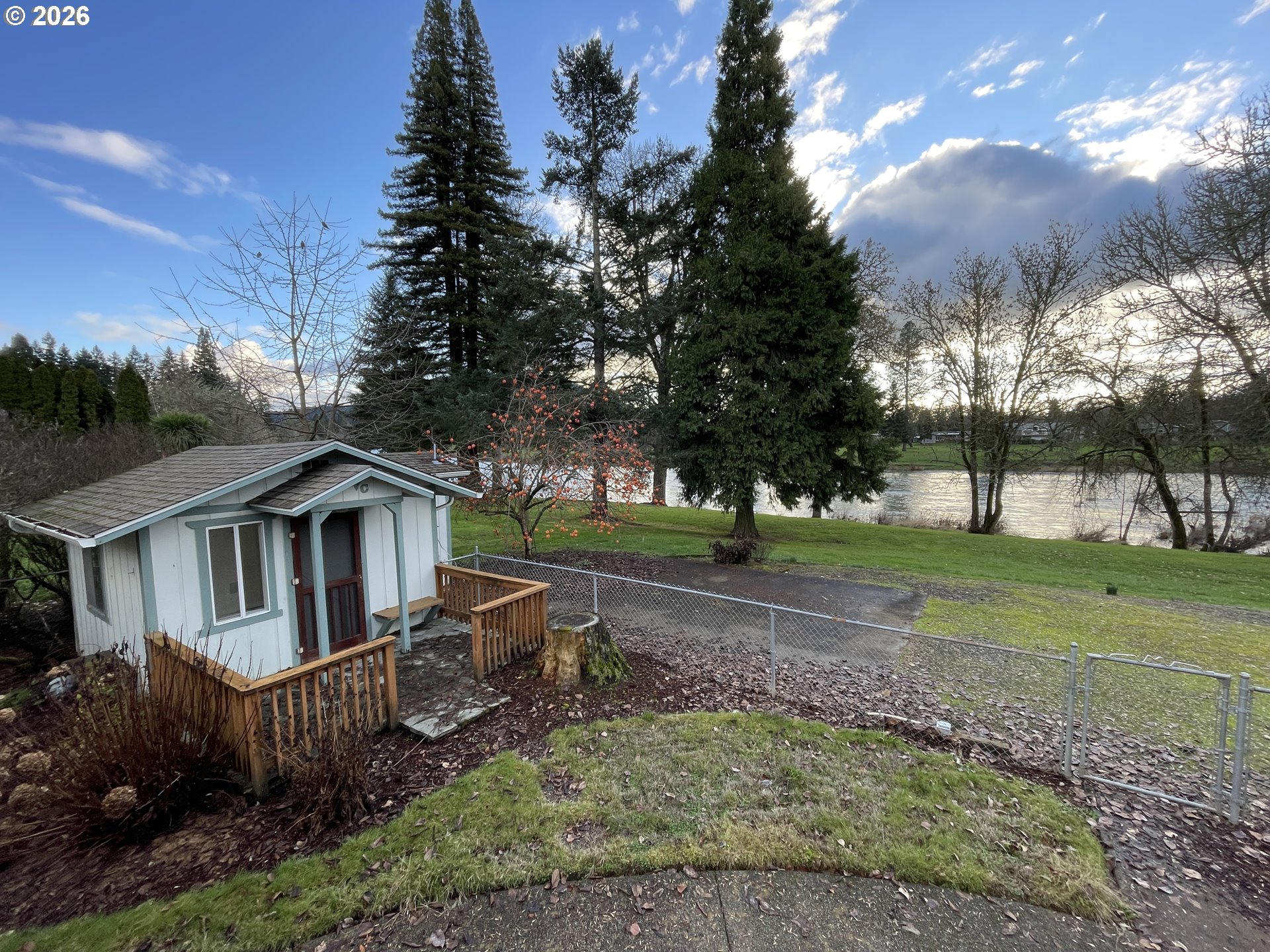 1732 Del Rio Road Roseburg, OR 97471 - Photo 26 of 39 a front view of a house with a yard