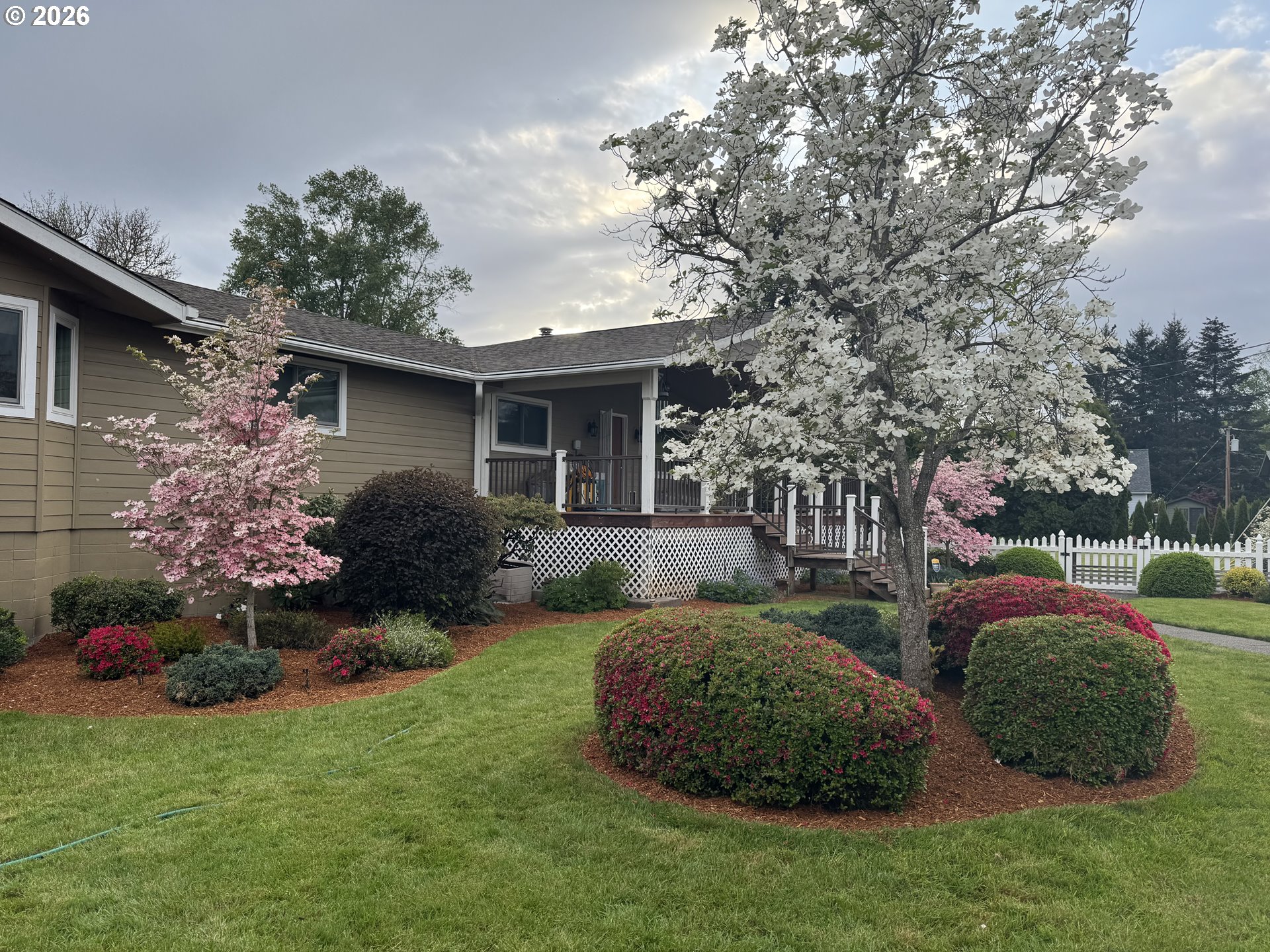 1732 Del Rio Road Roseburg, OR 97471 - Photo 5 of 39 a front view of a house with garden