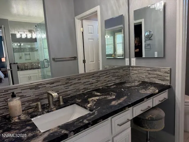 a kitchen view of a stove and a refrigerator