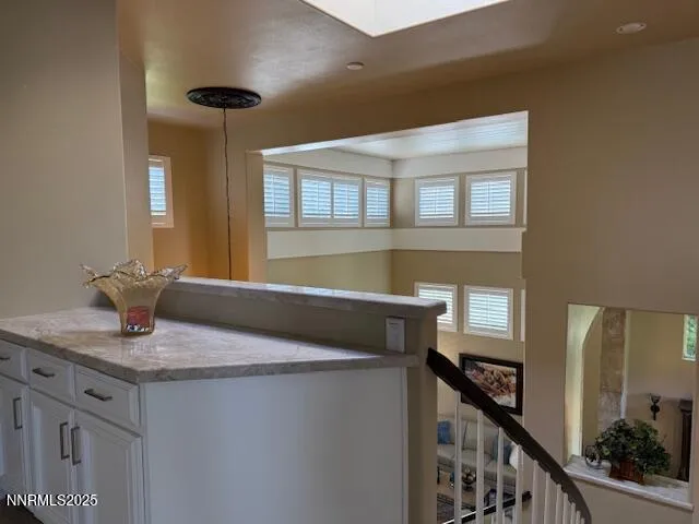 a kitchen with a sink and a refrigerator