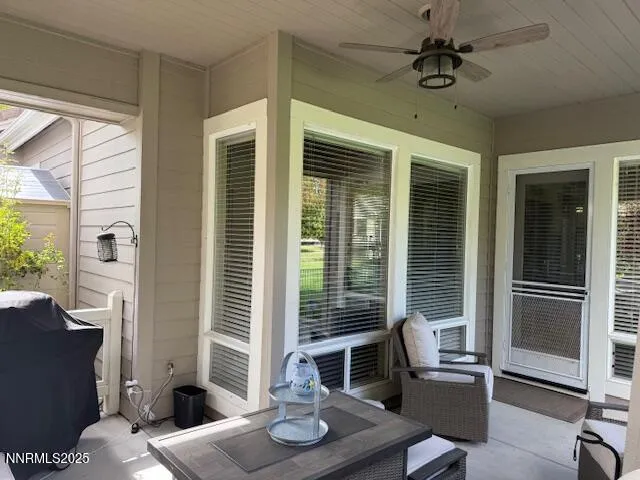 a living room with furniture and a window