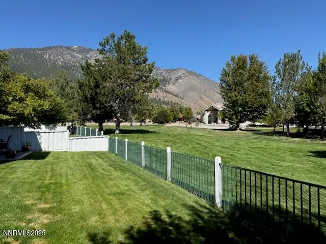 a view of a backyard with a garden