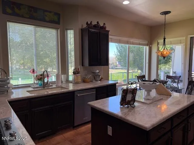 a kitchen with sink and window