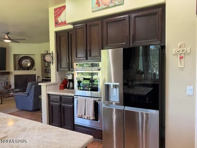 a kitchen with a refrigerator and a sink