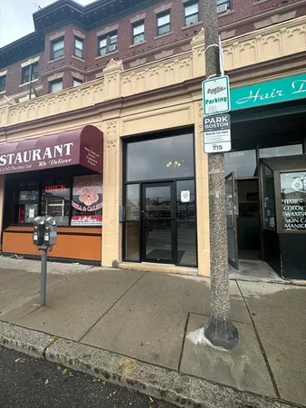 a view of a building with sitting area