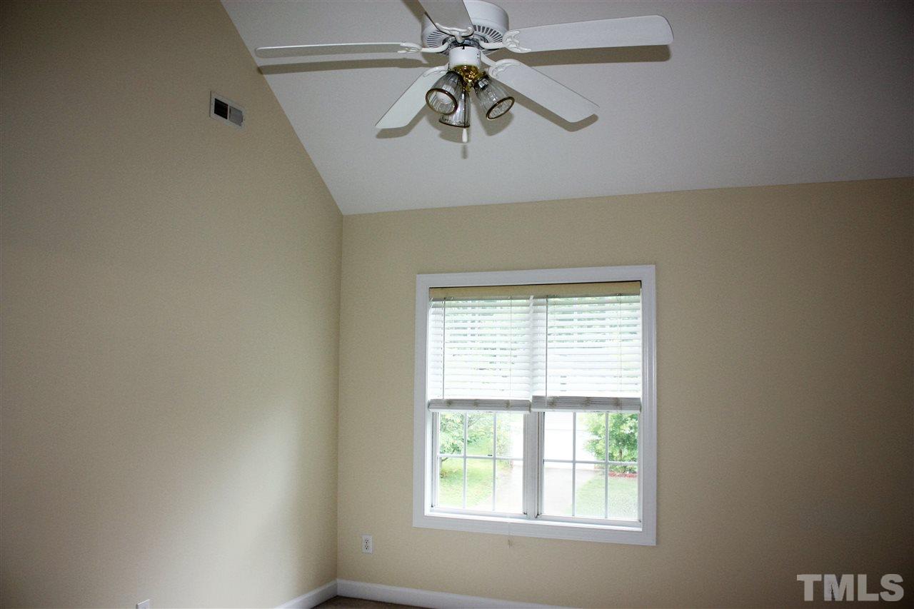 908 Cedar Downs Drive Raleigh, NC 27607 - Photo 17 of 25 a view of an entryway with a window