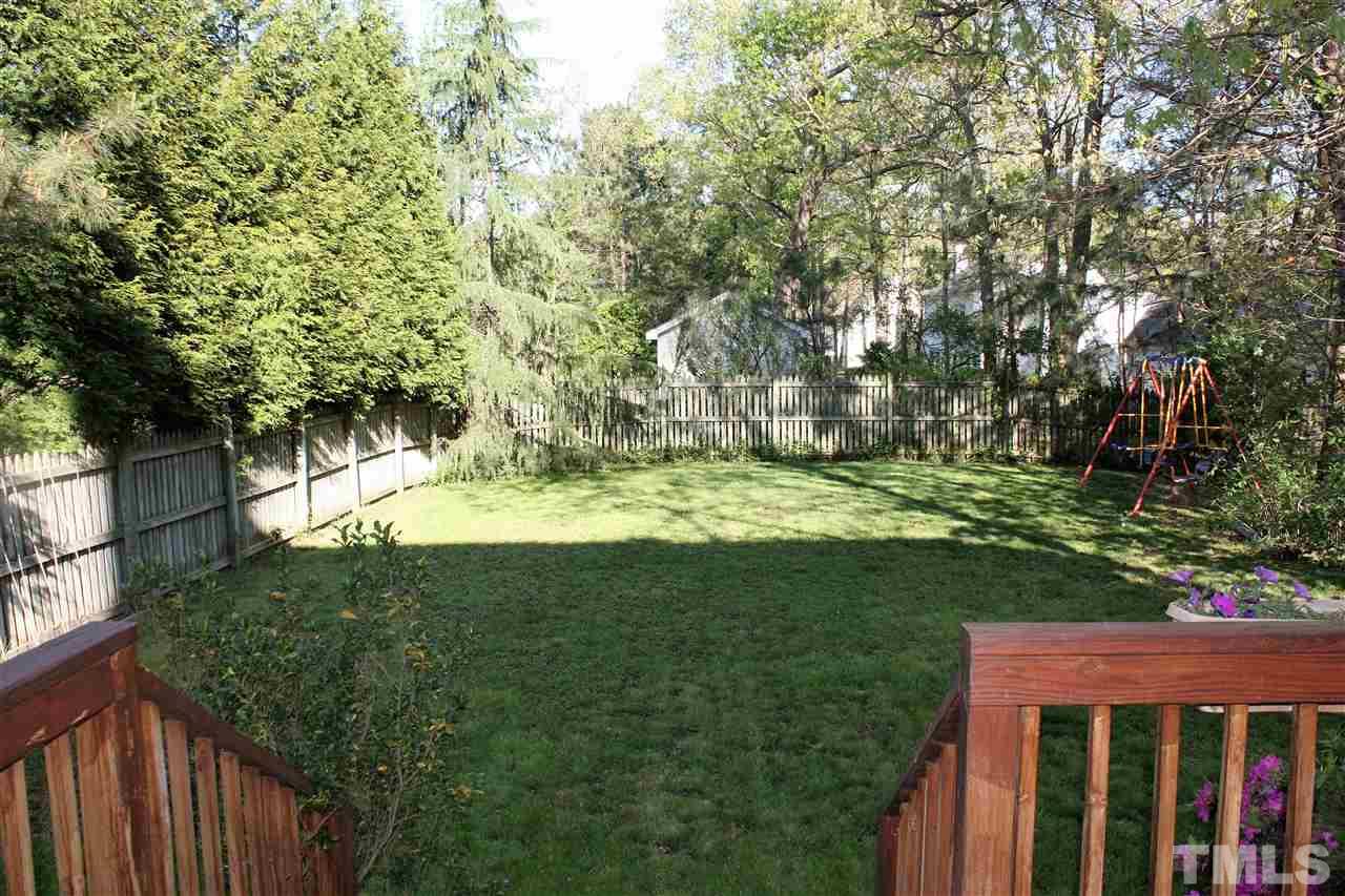 908 Cedar Downs Drive Raleigh, NC 27607 - Photo 21 of 25 a view of outdoor space and yard