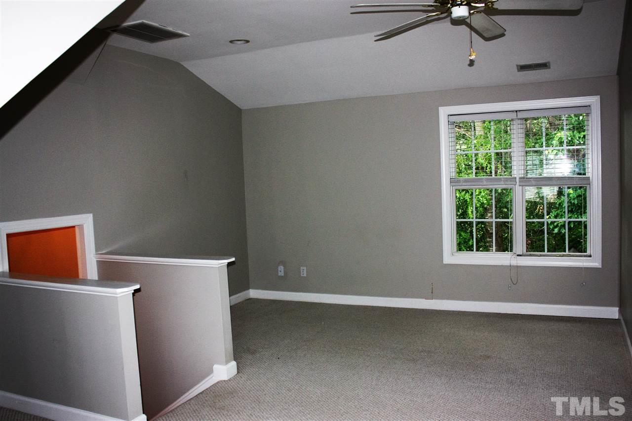908 Cedar Downs Drive Raleigh, NC 27607 - Photo 10 of 25 a view of a livingroom with a window