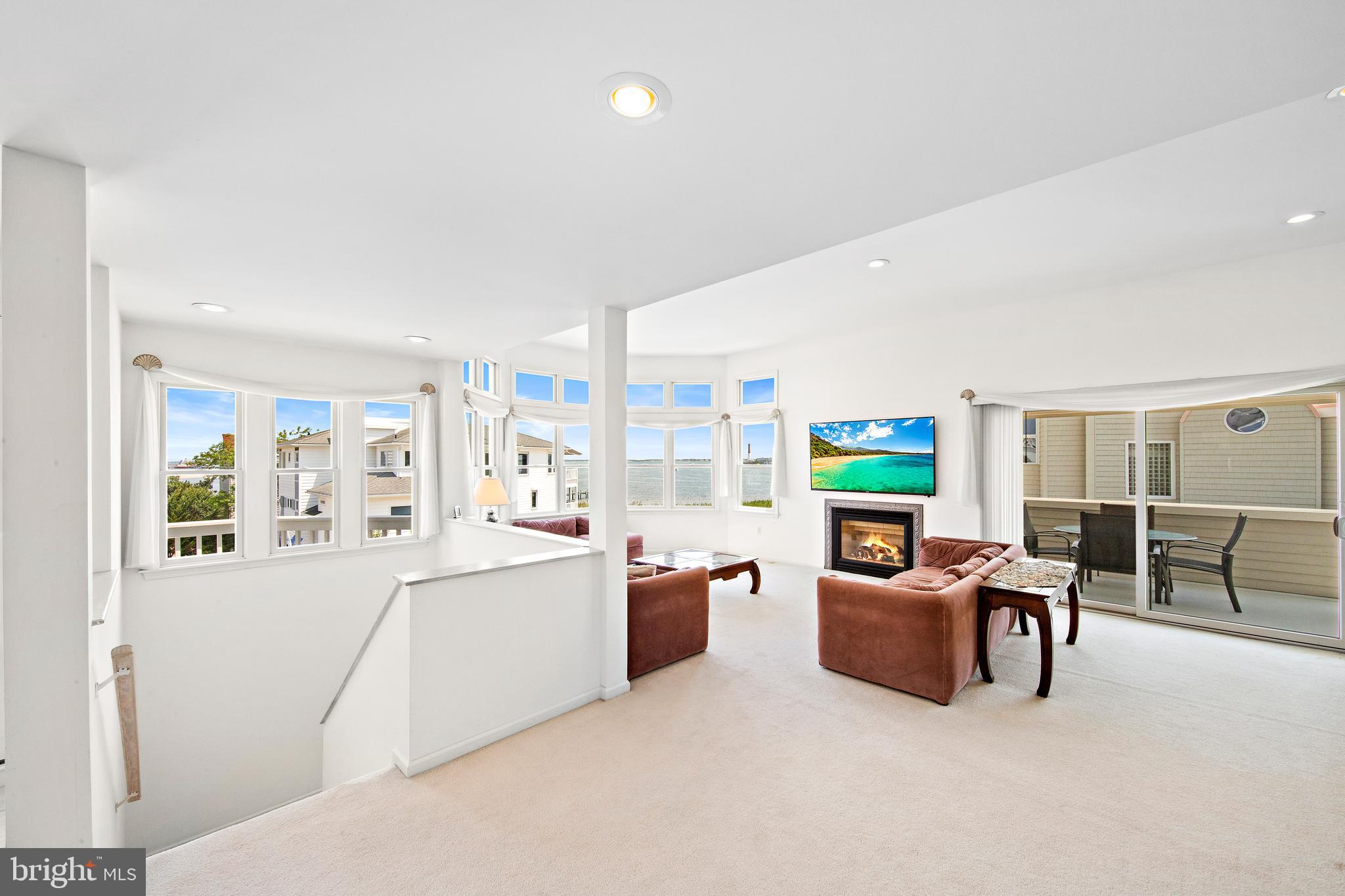 57 Sunset Boulevard Long Beach Township, NJ 08006 - Photo 12 of 65 Sliding doors leading to deck from livingroom