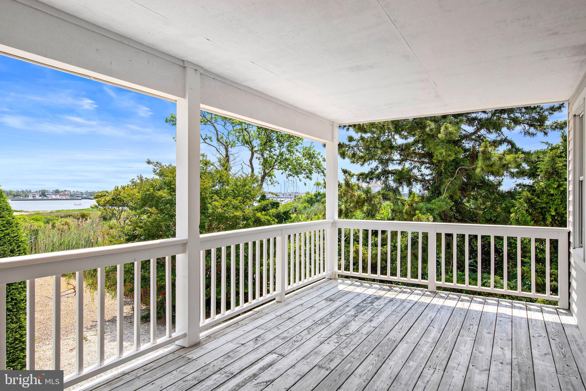 57 Sunset Boulevard Long Beach Township, NJ 08006 - Photo 29 of 65 Plenty of greenery to add to your deck privacy