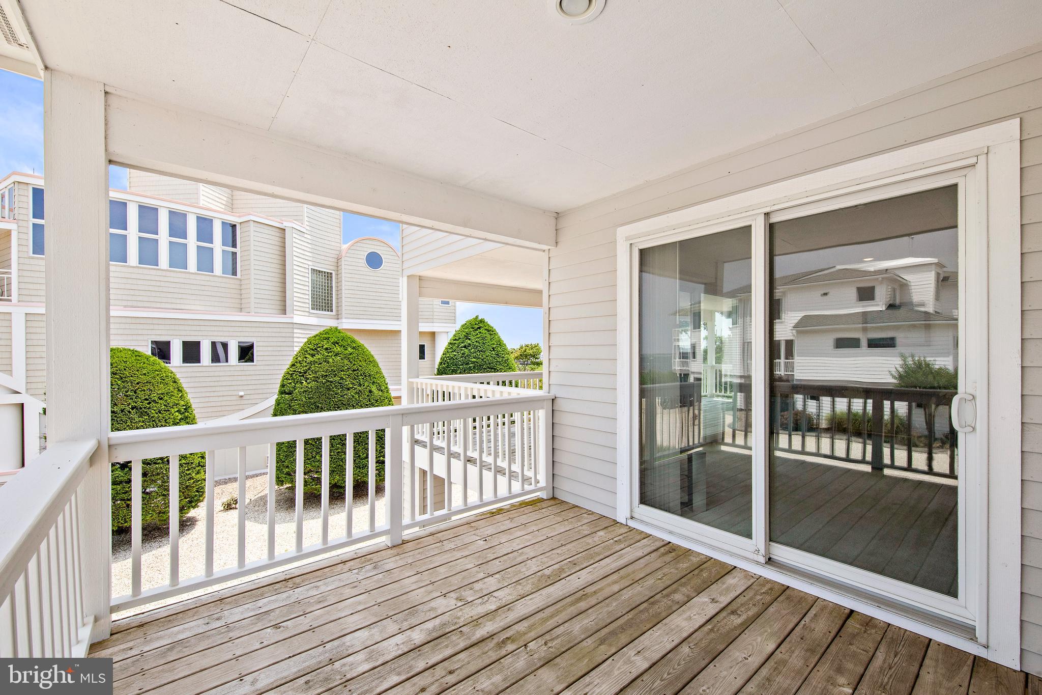 57 Sunset Boulevard Long Beach Township, NJ 08006 - Photo 34 of 65 Covered decking off 1st floor family room